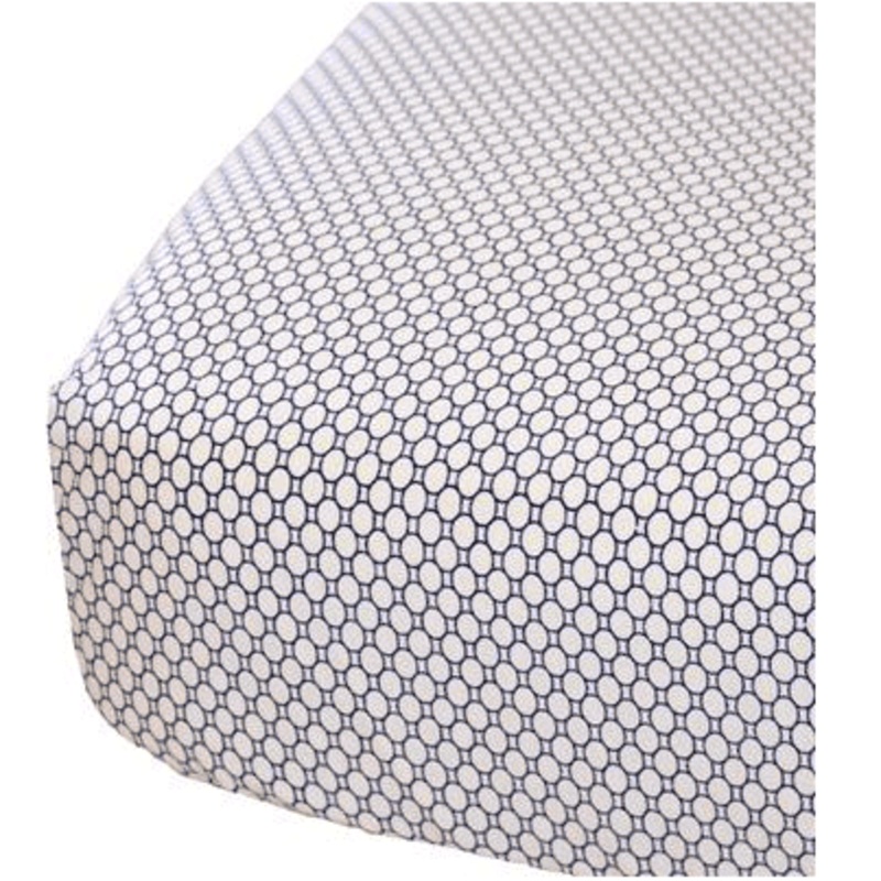 Oliver B Crib Sheet in White with Geometric Navy Circles