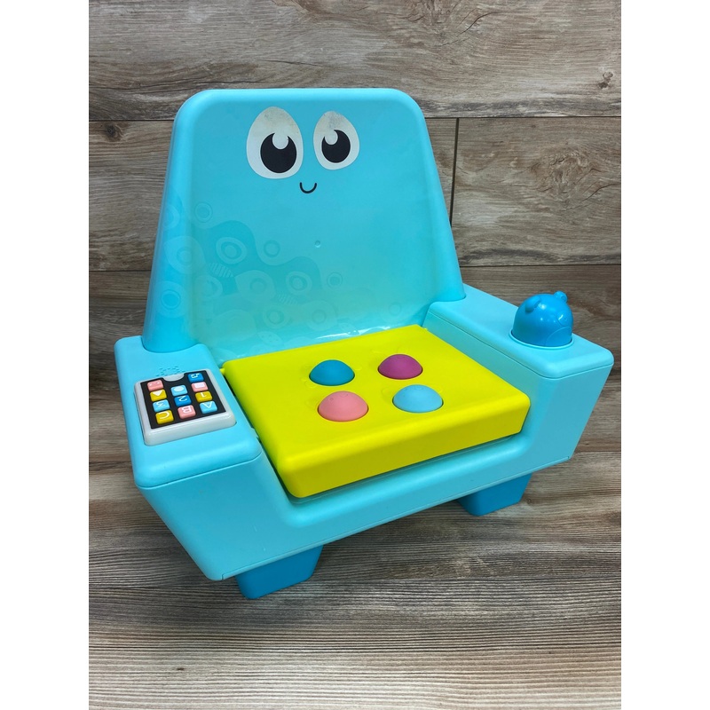 B. play Little Learner’s Interactive Musical Chair